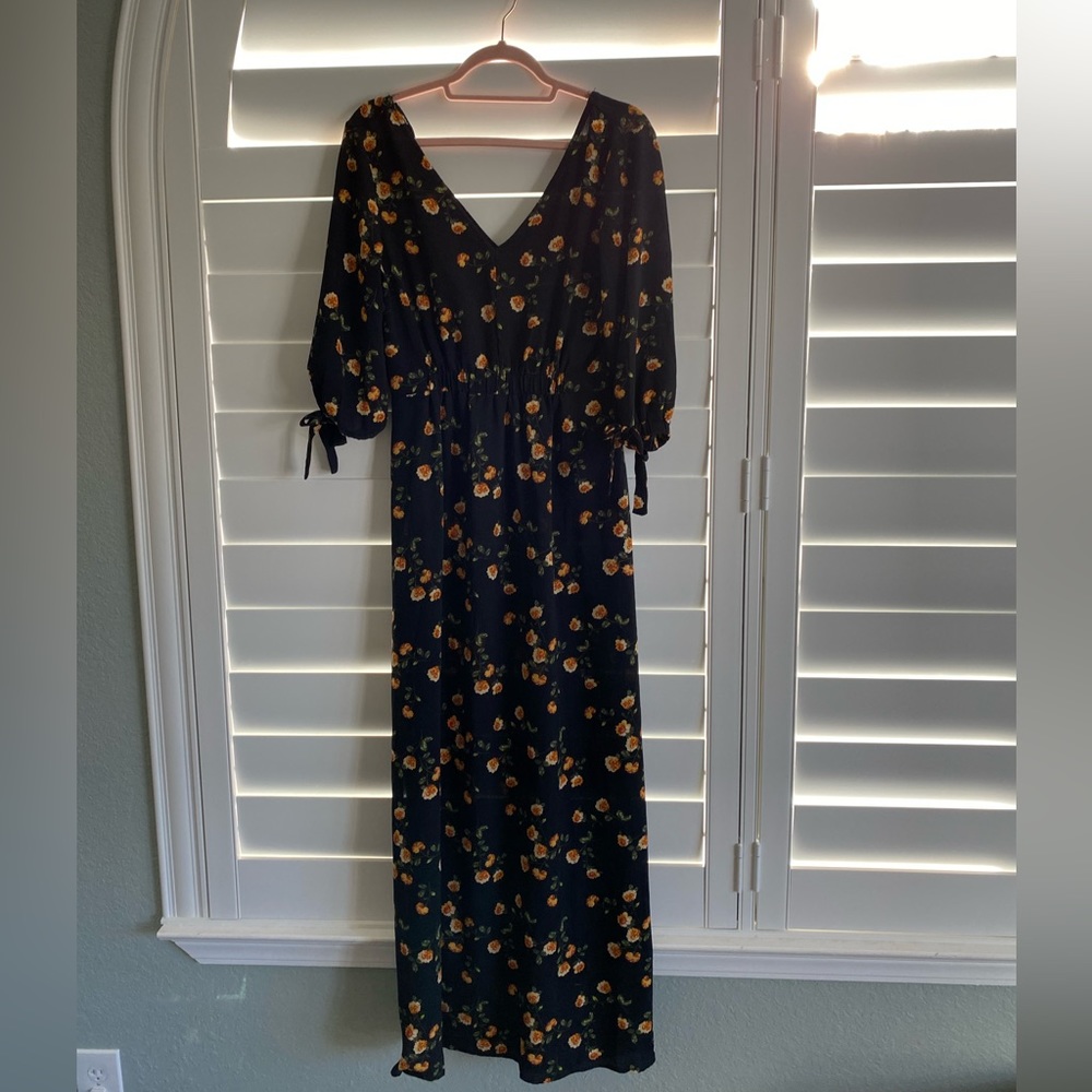 Black floral maxi dress with knee high slits